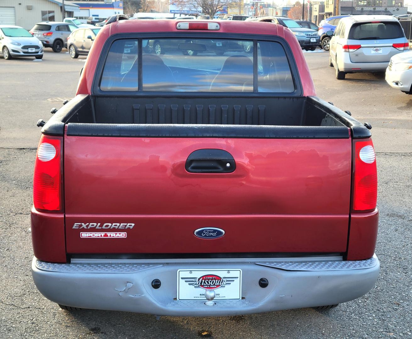 2001 Red /Gray Ford Explorer Sport Trac Sport Trac (1FMZU77E41U) with an 4.0L V6 engine, Automatic transmission, located at 450 N Russell, Missoula, MT, 59801, (406) 543-6600, 46.874496, -114.017433 - Highly Desirable little 4WD. Only 86K Miles. Air. Cruise. Tilt. Power Drivers Seat. Power Windows and Locks. AM FM CD Changer. Clean Carfax. This vehicle is more then 20 years old and is not eligible for lending through our finance companies. - Photo#5